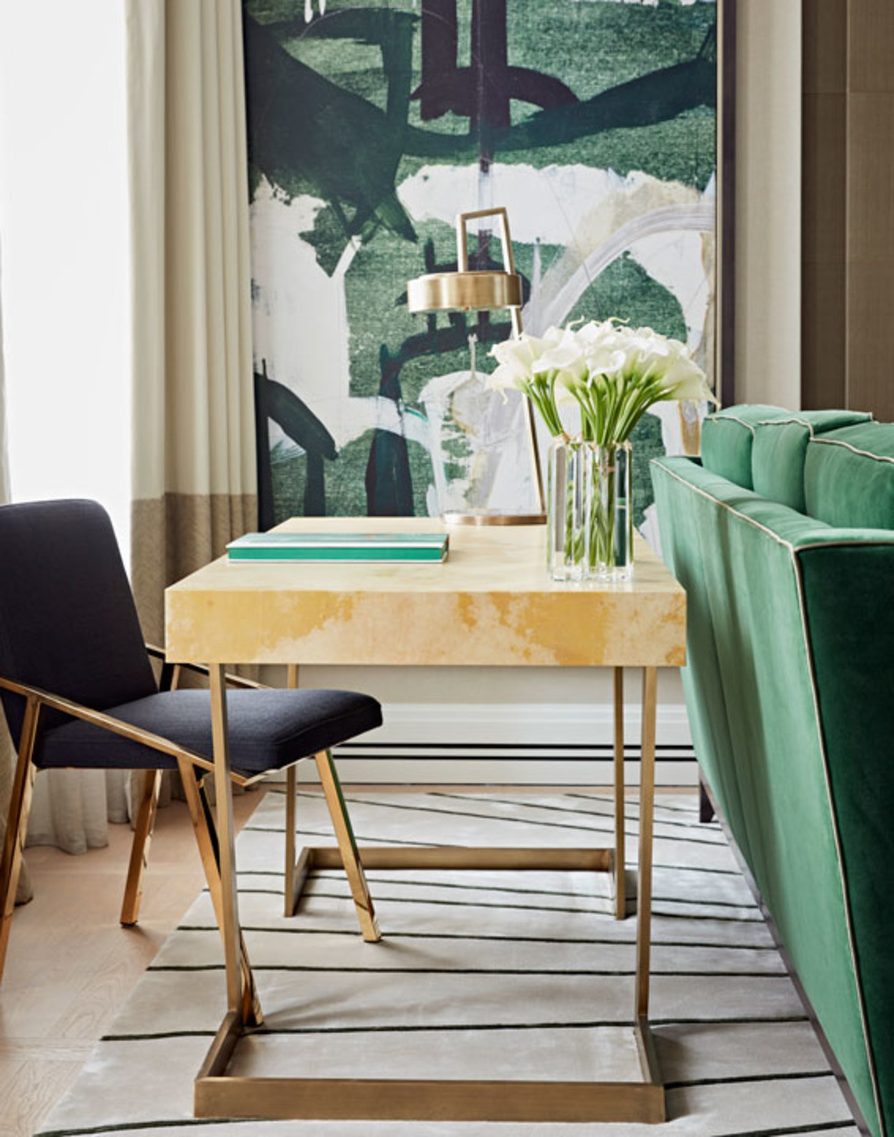 Designed by Taylor Howes London, this desk positioned behind the couch is a subtle way to incorporate