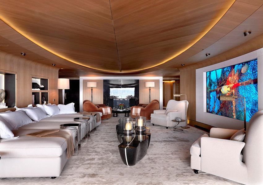 Designed by Achille Salvagni for a yacht, this luxe media room offers bed-like seating and a panorami