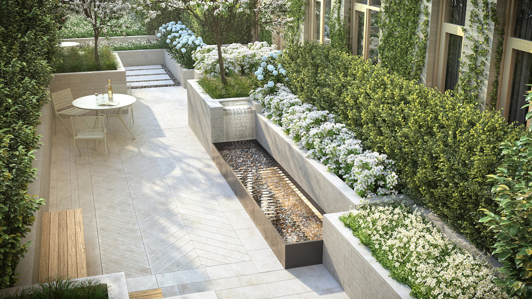 Designed by Edmund Hollander, the courtyard at 40 Bleecker in Manhattan features a lush wonderland of