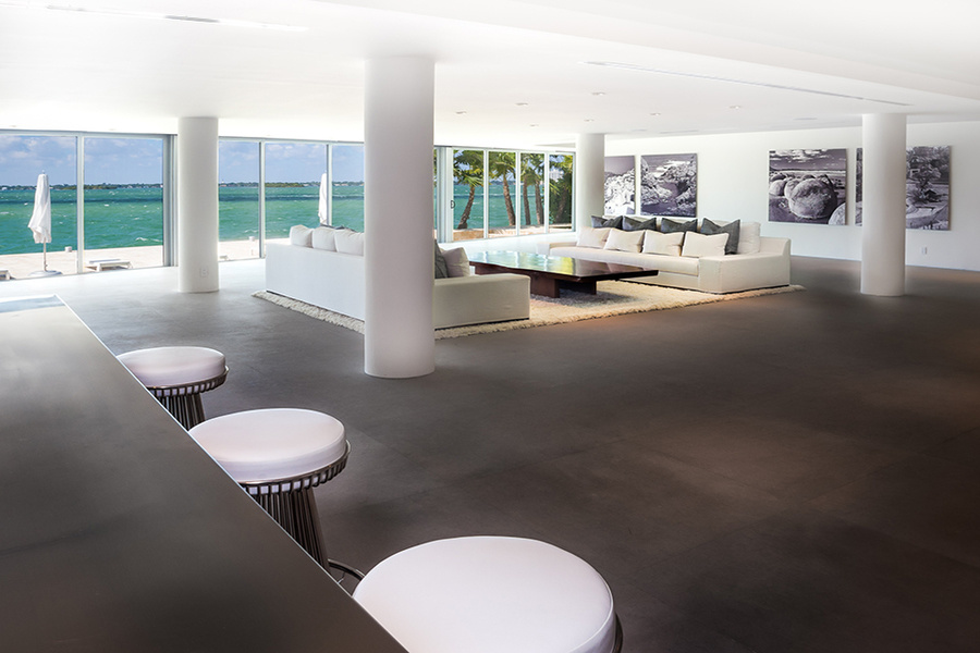 This Miami Beach home once belonged to musician Lenny Kravitz. The living room overlooks Biscayne Bay