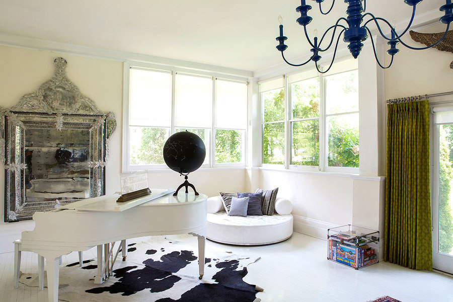 This Berkshires country house designed by The Novogratz features bleached wood flooring that lends an