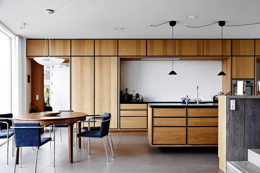 Ms. Hulgaard is doing more cooking in her bespoke kitchen designed by Copenhagen’s Garde Hvalsøe, a h